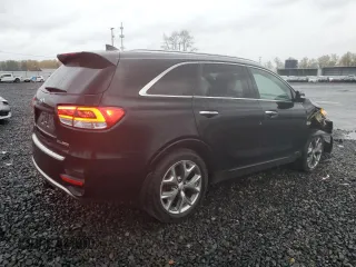 2016 Kia Sorento SXL z VIN 5XYPKDA19GG012725, wystawiony jako Copart lot #80313254 z przebiegiem 86 852 mil mil oraz Szkoda całkowita • Salvage title. Historia ofert i sprzedaży dostępna na DreamBid. Obrazek 3.