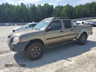 2002 Nissan Frontier XE z VIN 1N6ED29X92C320941, wystawiony jako Copart lot #56729885 z przebiegiem 326 461 mil mil oraz Szkoda całkowita • Salvage title. Historia ofert i sprzedaży dostępna na DreamBid. Obrazek 1.