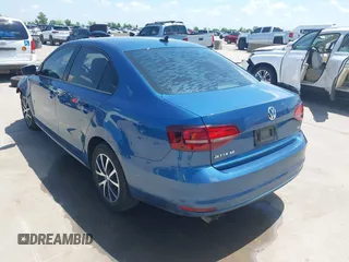 2016 Volkswagen Jetta Sedan 1.4T SE with VIN 3VWD67AJ8GM218112, listed as a IAAI auction lot 42061478 with 84,860 mi miles. Bid and sale history available at carsss.com. Image 3.