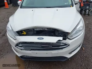 2015 Ford Focus Titanium with VIN 1FADP3N23FL293432, listed as a IAAI auction lot 41929774 with 100,865 mi miles. Bid and sale history available at carsss.com. Image 6.