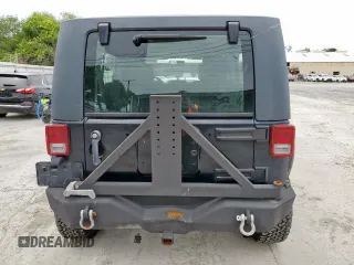 2008 Jeep Wrangler Unlimited Rubicon z VIN 1J4GA69128L529271, wystawiony jako Copart lot #58939945 z przebiegiem 94 503 mil mil oraz Szkoda całkowita • Salvage title. Historia ofert i sprzedaży dostępna na DreamBid. Obrazek 6.