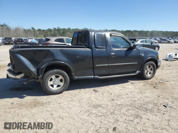 1999 Ford F-150 with VIN 1FTRX17W0XNA48744, listed as a Copart auction lot 49479635 with Not Provided miles and Salvage Title. Bid and sale history available at DreamBid. Image 3.