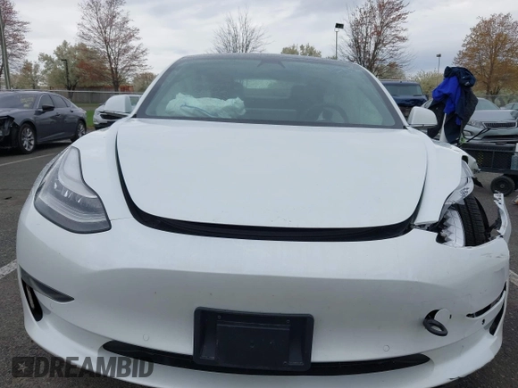 2020 Tesla Model 3 Standard Range Plus z VIN 5YJ3E1EA3LF590450, wystawiony jako IAAI lot #42026296 z przebiegiem 68 242 mil mil oraz . Historia ofert i sprzedaży dostępna na DreamBid. Obrazek 6.