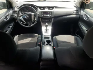 2015 Nissan Sentra S with VIN 3N1AB7AP0FY303851, listed as a Copart auction lot 54795265 with 123,385 mi miles and Salvage Title. Bid and sale history available at carsss.com. Image 8.