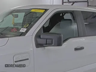 2022 Ford F-150 Lightning Pro with VIN 1FTVW1EL5NWG11725, listed as a IAAI auction lot 42832825 with 5,044 mi miles and . Bid and sale history available at DreamBid. Image 18.