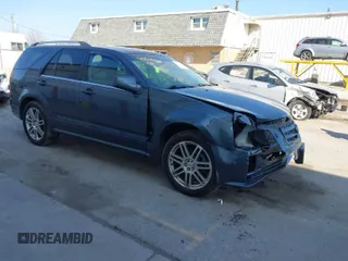 2008 Cadillac SRX AWD with VIN 1GYEE437580158105, listed as a IAAI auction lot 41777201 with 136,561 mi miles. Bid and sale history available at carsss.com. Image 1.