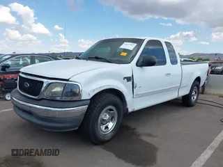 2003 Ford F-150 XL with VIN 1FTRX17L43NB82477, listed as a IAAI auction lot 42427957 with Not provided miles and . Bid and sale history available at DreamBid. Image 2.