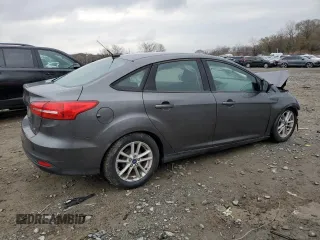 2018 Ford Focus SE with VIN 1FADP3F29JL206477, listed as a Copart auction lot 50410345 with 70,955 mi miles and Salvage Title. Bid and sale history available at DreamBid. Image 3.