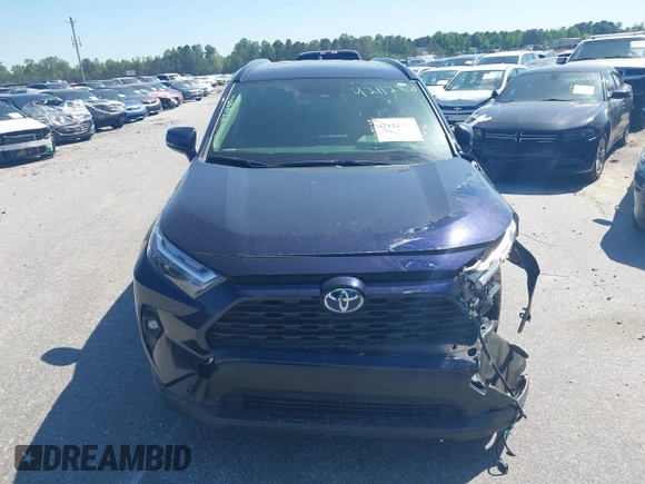 2023 Toyota RAV4 Hybrid XLE Premium with VIN JTMB6RFV4PD098886, listed as a IAAI auction lot 42112706 with 47,743 mi miles and . Bid and sale history available at DreamBid. Image 13.