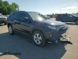 2019 Toyota RAV4 XLE with VIN 2T3W1RFV7KW029959, listed as a Copart auction lot 61825405 with 36,180 mi miles and Salvage title. Bid and sale history available at DreamBid. Image 14.
