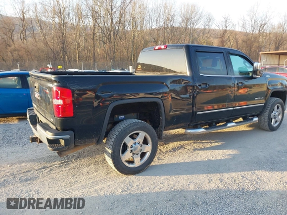 2015 GMC Sierra 2500HD available WiFi SLT with VIN 1GT12ZEG7FF606328, listed as a IAAI auction lot 41793799 with 94,107 mi miles. Bid and sale history available at carsss.com. Image 4.