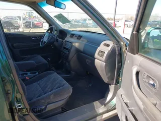 2000 Honda CR-V EX with VIN JHLRD176XYC035377, listed as a IAAI auction lot 41694054 with 196,985 mi miles. Bid and sale history available at carsss.com. Image 5.