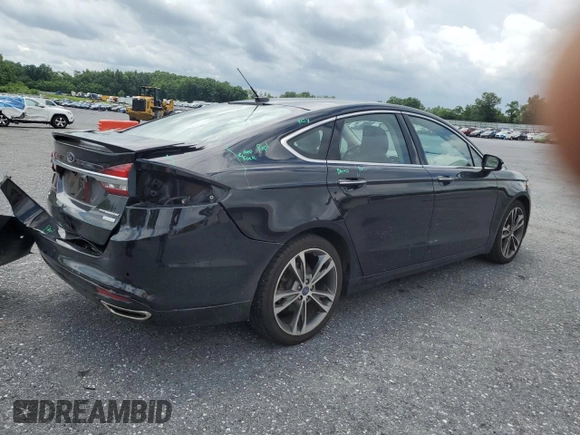 2017 Ford Fusion Titanium z VIN 3FA6P0K92HR192881, wystawiony jako Copart lot #61190515 z przebiegiem 109 834 mil mil oraz Szkoda całkowita • Salvage title. Historia ofert i sprzedaży dostępna na DreamBid. Obrazek 3.