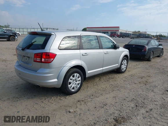 2014 Dodge Journey SE with VIN 3C4PDCAB0ET139916, listed as a IAAI auction lot 42072199 with 92,591 mi miles and . Bid and sale history available at DreamBid. Image 4.