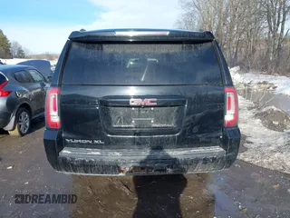 2015 GMC Yukon XL SLT with VIN 1GKS2HKC9FR159164, listed as a IAAI auction lot 41708822 with 136,730 mi miles. Bid and sale history available at carsss.com. Image 16.