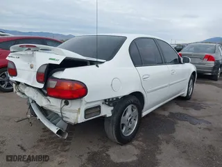 2002 Chevrolet Malibu LS with VIN 1G1NE52J22M547351, listed as a IAAI auction lot 40978949 with 118,437 mi miles. Bid and sale history available at carsss.com. Image 4.