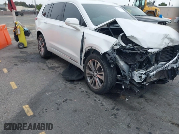2020 Cadillac XT6 AWD Premium Luxury with VIN 1GYKPDRS3LZ197322, listed as a IAAI auction lot 41722467 with 58,128 mi miles and . Bid and sale history available at DreamBid. Image 1.