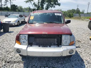2007 Jeep Commander Sport with VIN 1J8HG48K07C684965, listed as a Copart auction lot 58061005 with 208,951 mi miles and Salvage title. Bid and sale history available at DreamBid. Image 5.