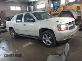 2012 Chevrolet Avalanche LTZ with VIN 3GNTKGE71CG115669, listed as a IAAI auction lot 41851031 with 128,873 mi miles. Bid and sale history available at carsss.com. Image 1.