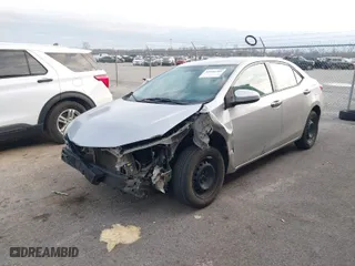 2016 Toyota Corolla L with VIN 5YFBURHE4GP486538, listed as a IAAI auction lot 41558789 with 166,106 mi miles. Bid and sale history available at carsss.com. Image 2.