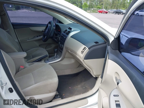 2012 Toyota Corolla L with VIN 5YFBU4EE5CP044613, listed as a IAAI auction lot 42113624 with 208,780 mi miles and . Bid and sale history available at carsss.com. Image 5.