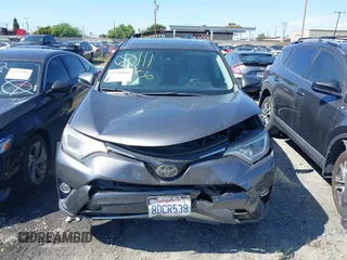 2018 Toyota RAV4 XLE with VIN JTMWFREV6JJ175575, listed as a IAAI auction lot 41788004 with 112,577 mi miles. Bid and sale history available at carsss.com. Image 12.