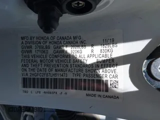 2020 Honda Civic LX with VIN 2HGFC2F67LH511473, listed as a IAAI auction lot 42614633 with 91,822 mi miles and . Bid and sale history available at DreamBid. Image 9.