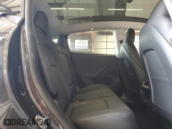 2024 Tesla Model Y Long Range z VIN 7SAYGDEE2RA246928, wystawiony jako Copart lot #60996035 z przebiegiem 19 266 mil mil oraz Szkoda całkowita • Salvage title. Historia ofert i sprzedaży dostępna na DreamBid. Obrazek 11.
