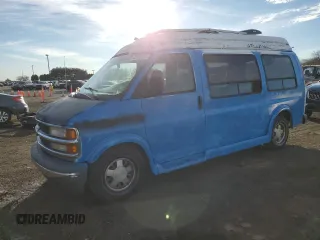 1999 Chevrolet Express with VIN 1GBFG15R5X1100445, listed as a Copart auction lot 82358104 with 154,515 mi miles and Clean Title. Bid and sale history available at carsss.com. Image 1.