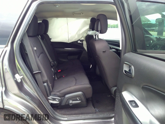 2018 Dodge Journey SE with VIN 3C4PDCAB4JT296083, listed as a IAAI auction lot 41976090 with 63,051 mi miles and . Bid and sale history available at DreamBid. Image 8.