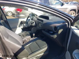 2013 Toyota Prius c One with VIN JTDKDTB36D1034076, listed as a IAAI auction lot 41622385 with 148,920 mi miles. Bid and sale history available at carsss.com. Image 5.