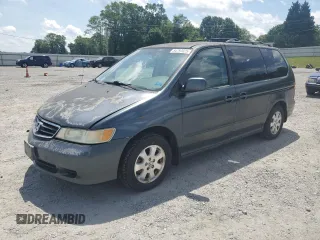 2003 Honda Odyssey EX z VIN 5FNRL18623B121793, wystawiony jako Copart lot #54797025 z przebiegiem 252 816 mil mil oraz Szkoda całkowita • Salvage title. Historia ofert i sprzedaży dostępna na DreamBid. Obrazek 1.