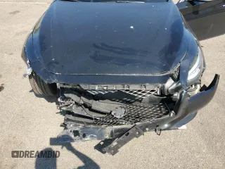 2015 Infiniti Q50 Premium with VIN JN1BV7ARXFM406453, listed as a Copart auction lot 54661515 with 77,298 mi miles and Salvage Title. Bid and sale history available at carsss.com. Image 11.