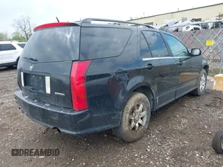 2008 Cadillac SRX RWD z VIN 1GYEE637180139577, wystawiony jako IAAI lot #42161039 z przebiegiem 159 816 mil mil oraz . Historia ofert i sprzedaży dostępna na DreamBid. Obrazek 4.