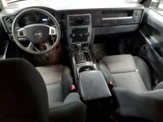 2010 Jeep Commander Sport with VIN 1J4RG4GK2AC127697, listed as a Copart auction lot 87582415 with 204,676 mi miles and Salvage Title. Bid and sale history available at carsss.com. Image 8.