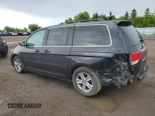 2009 Honda Odyssey Touring with VIN 5FNRL38809B503357, listed as a Copart auction lot 58035914 with 191,671 mi miles and Salvage Title. Bid and sale history available at carsss.com. Image 2.