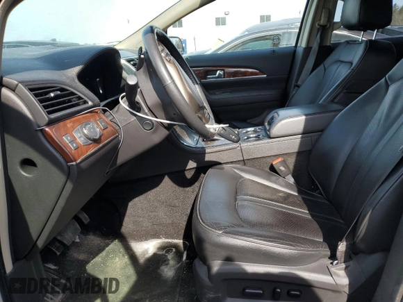 2014 Lincoln MKX with VIN 2LMDJ8JK1EBL19698, listed as a Copart auction lot 48808775 with 165,761 mi miles and Clean Title. Bid and sale history available at DreamBid. Image 7.