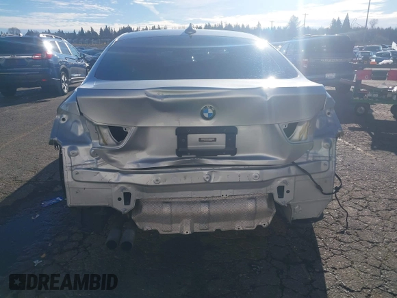 2015 BMW 4 Series 428i with VIN WBA4A5C58FG051293, listed as a IAAI auction lot 41255541 with 60,737 mi miles and . Bid and sale history available at DreamBid. Image 6.