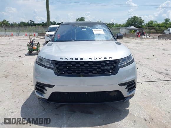 2021 Land Rover Range Rover Velar R-Dynamic S z VIN SALYT2EX9MA315965, wystawiony jako IAAI lot #42344448 z przebiegiem 66 819 mil mil oraz . Historia ofert i sprzedaży dostępna na DreamBid. Obrazek 13.