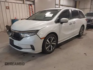 2021 Honda Odyssey Touring with VIN 5FNRL6H80MB026908, listed as a IAAI auction lot 41564765 with 116,453 mi miles. Bid and sale history available at carsss.com. Image 17.