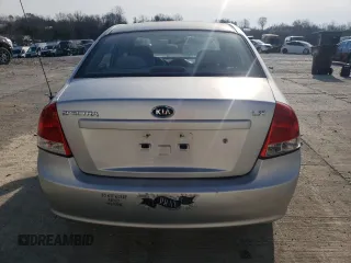 2009 Kia Spectra LX with VIN KNAFE221895659552, listed as a Copart auction lot 82555924 with 114,704 mi miles and Salvage Title. Bid and sale history available at carsss.com. Image 6.