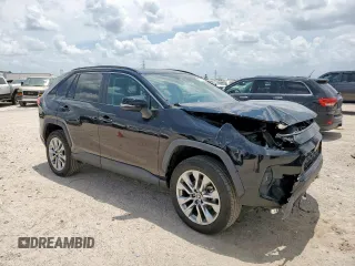 2022 Toyota RAV4 XLE Premium with VIN 2T3A1RFVXNC310217, listed as a Copart auction lot 65779855 with 31,626 mi miles and Salvage title. Bid and sale history available at DreamBid. Image 4.