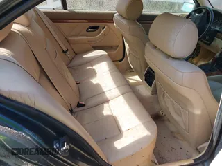 1997 BMW 5 Series 528iA with VIN WBADD6329VBW04841, listed as a IAAI auction lot 42038507 with 147,762 mi miles. Bid and sale history available at carsss.com. Image 8.