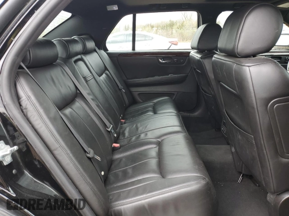 2007 Cadillac DTS Performance with VIN 1G6KD57937U201301, listed as a Copart auction lot 52868565 with 119,972 mi miles and Salvage Title. Bid and sale history available at carsss.com. Image 10.