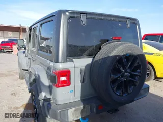2023 Jeep Wrangler 4xe Sahara with VIN 1C4JJXP68PW661190, listed as a IAAI auction lot 41816483 with 41,877 mi miles. Bid and sale history available at carsss.com. Image 16.