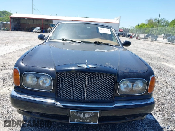 1999 Bentley Arnage z VIN SCBLB51E1XCX01401, wystawiony jako IAAI lot #42133144 z przebiegiem 29 699 mil mil oraz . Historia ofert i sprzedaży dostępna na DreamBid. Obrazek 12.