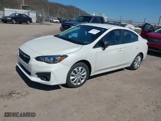 2018 Subaru Impreza with VIN 4S3GKAA6XJ3613244, listed as a IAAI auction lot 42036955 with 77,272 mi miles. Bid and sale history available at carsss.com. Image 2.
