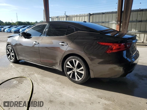 2016 Nissan Maxima SL with VIN 1N4AA6AP4GC906750, listed as a Copart auction lot 60691725 with 104,994 mi miles and Salvage title. Bid and sale history available at DreamBid. Image 2.