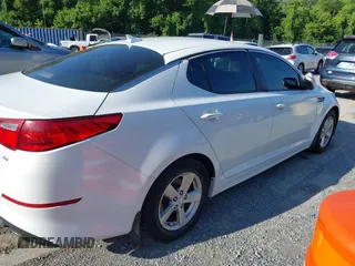 2015 Kia Optima LX with VIN 5XXGM4A70FG472650, listed as a IAAI auction lot 42698013 with 213,713 mi miles and . Bid and sale history available at DreamBid. Image 4.