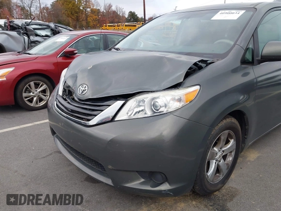 2012 Toyota Sienna LE AAS with VIN 5TDKK3DC5CS253020, listed as a IAAI auction lot 40900034 with 208,421 mi miles. Bid and sale history available at carsss.com. Image 6.
